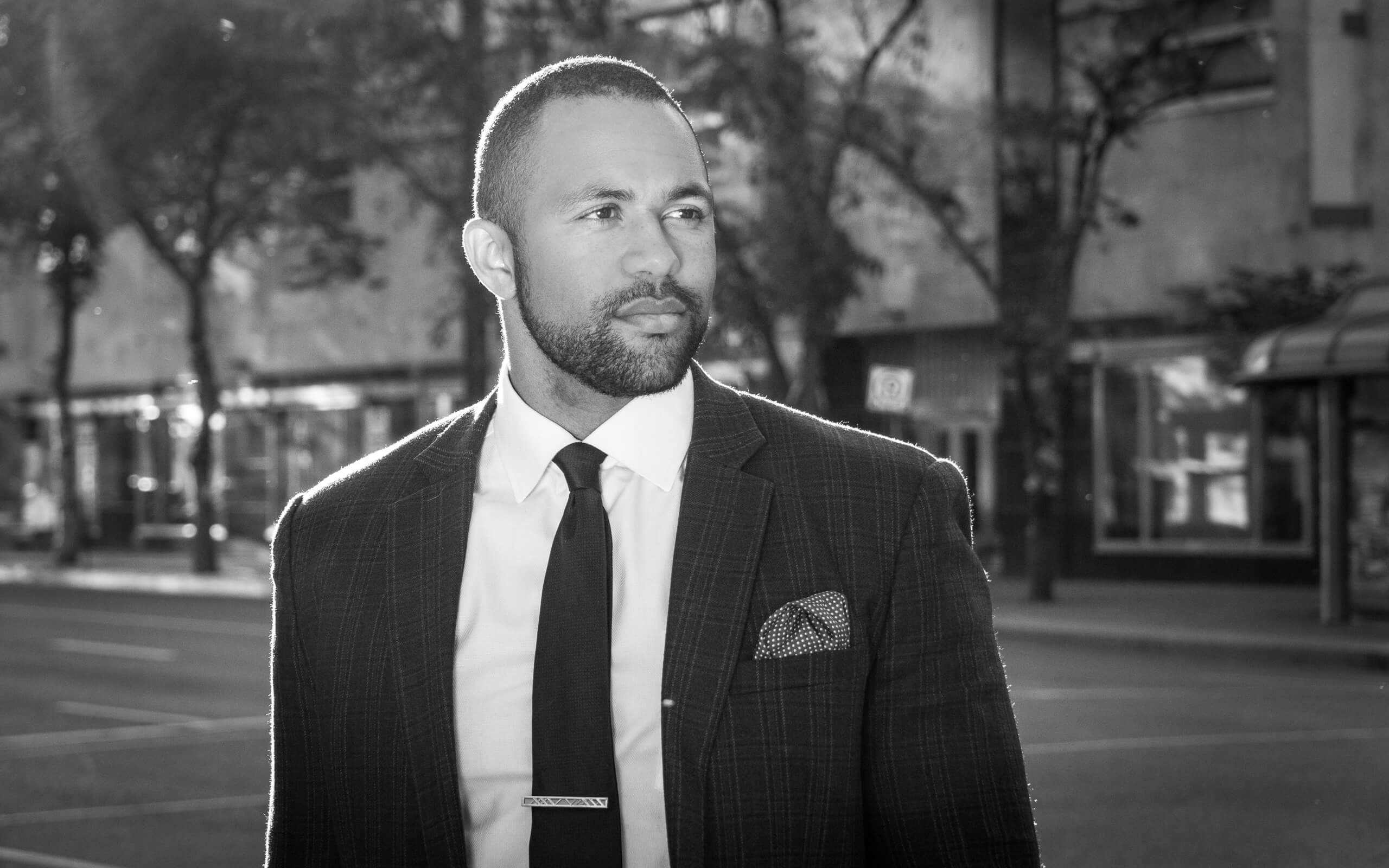 Professional Headshots. LIFELIGHTLENS image of businessman in a suit.