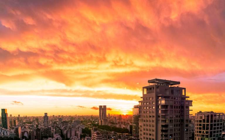 Cityscape Photos. LIFELIGHTLENS images of a fiery sunset in Buenos Aires Argentina.