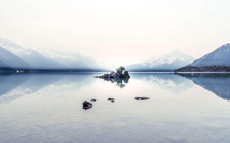 Landscape Photos. Featured LIFELIGHTLENS image of an island in the middle of a calm lake reflection