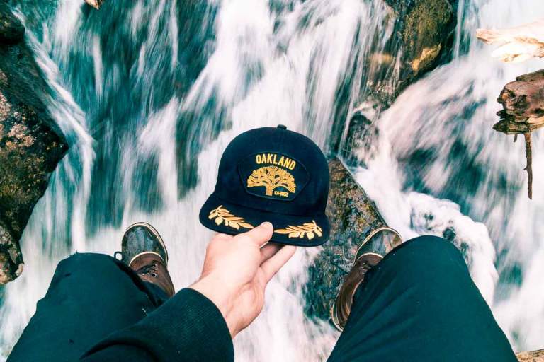 Marketing Image Content. Branding photography featuring a Goorin Bros Canada hat over a waterfall.