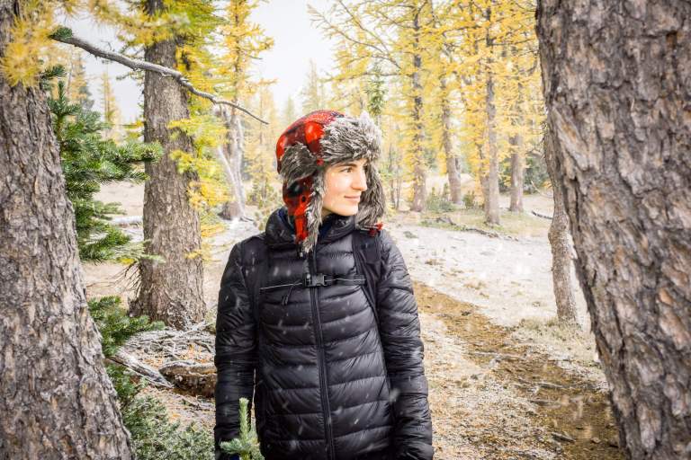 Portrait Photos. LIFELIGHTLENS image of a woman exploring the wild winter forest.