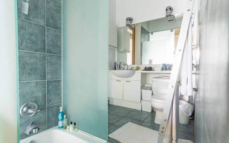 Real Estate Photography. Condo photos of a shower in a loft