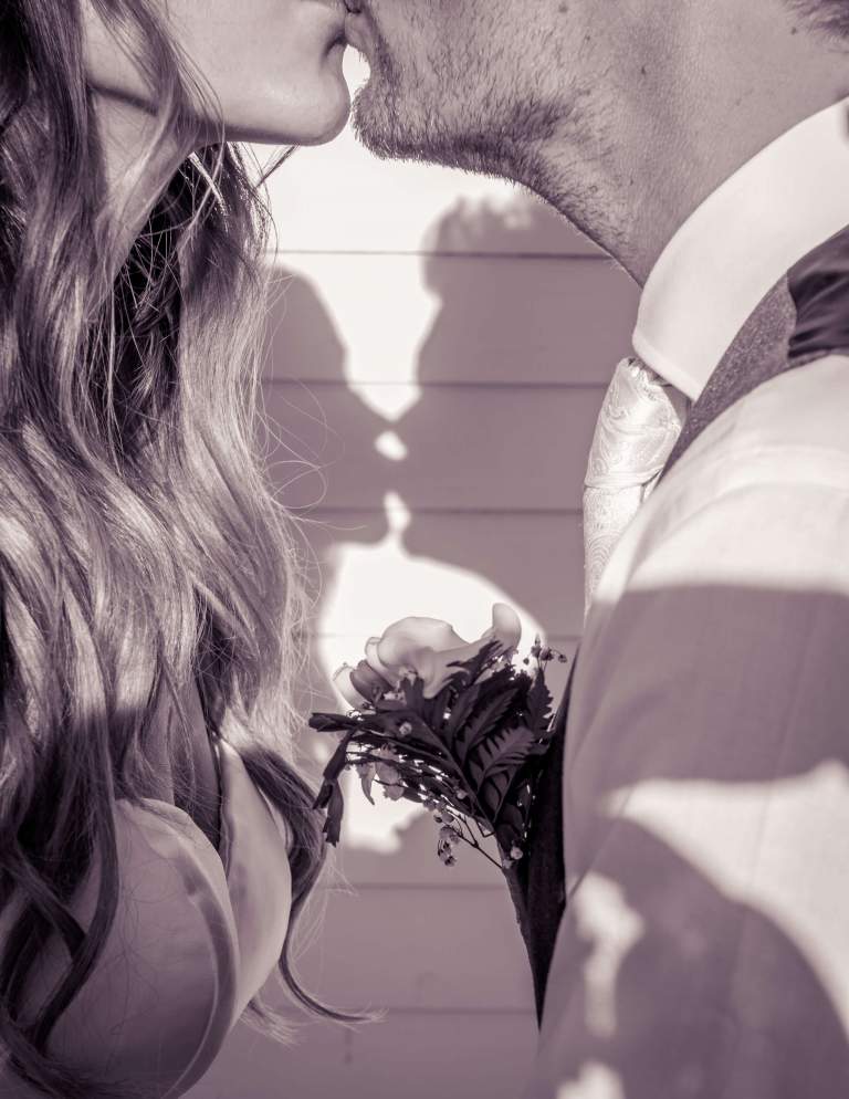 Wedding ideas. LIFELIGHTLENS image of a couples shadows kissing.
