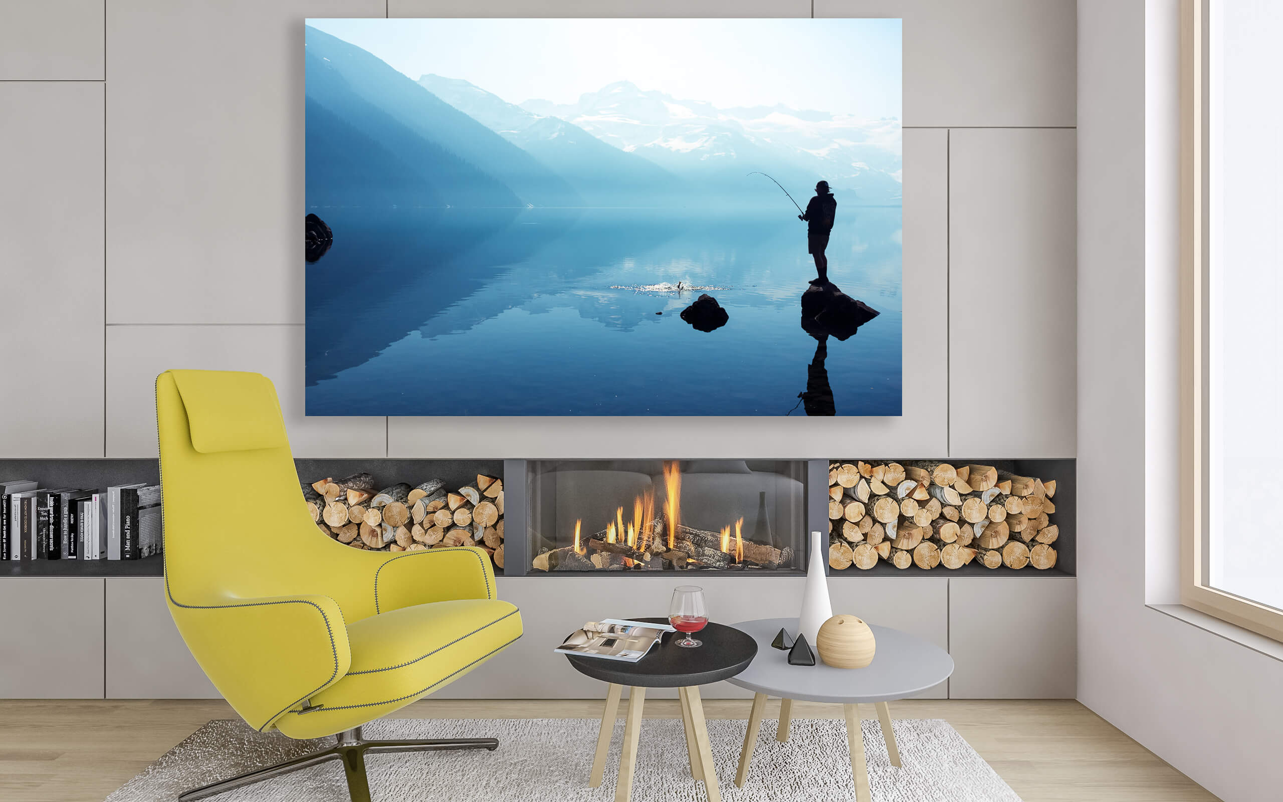 There is a living room with a picture of a man fishing on a blue lake