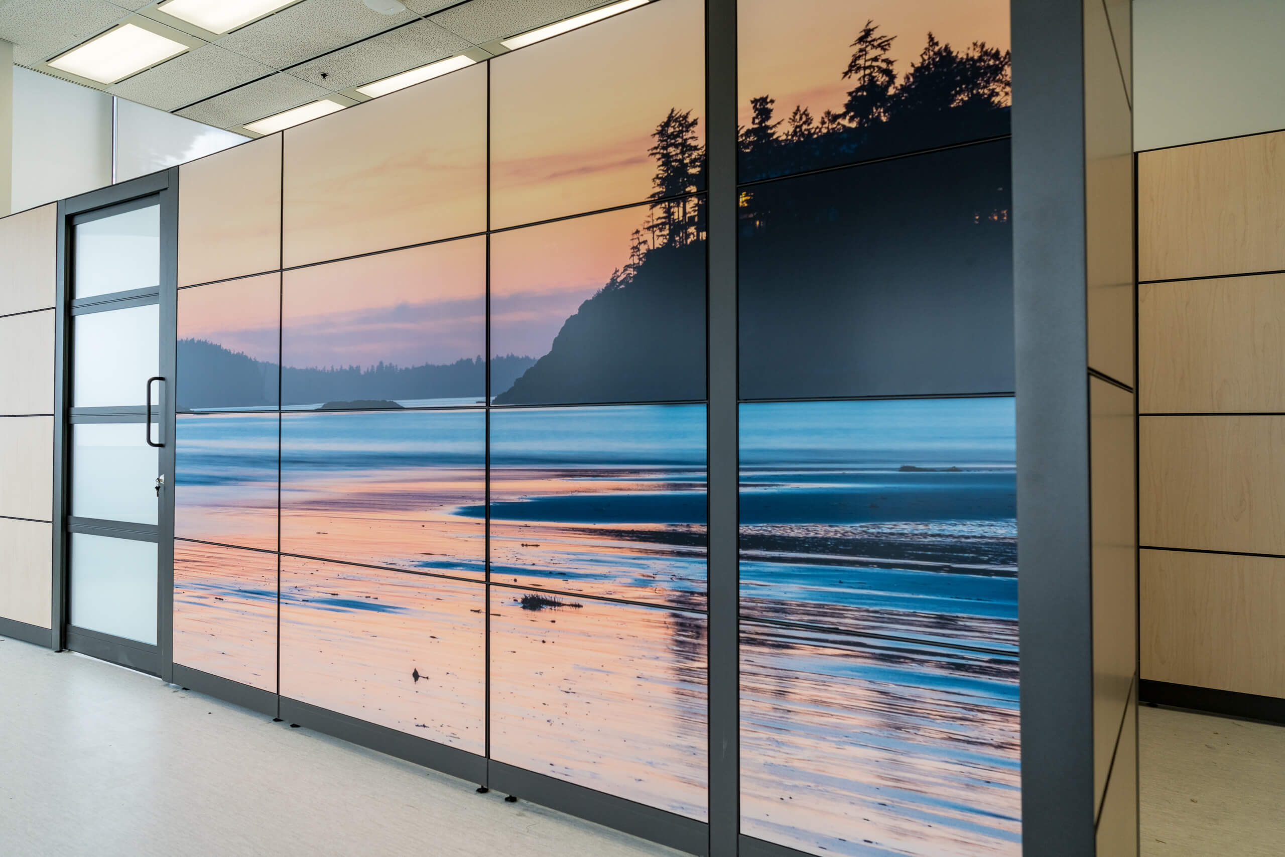 VCH-health-care-mural-large-format-artwork-1 A wall panel system in a health care setting has a photographic wall mural of the Salish BC coast at sunset applied to it. This helps create a calming environment for patients.